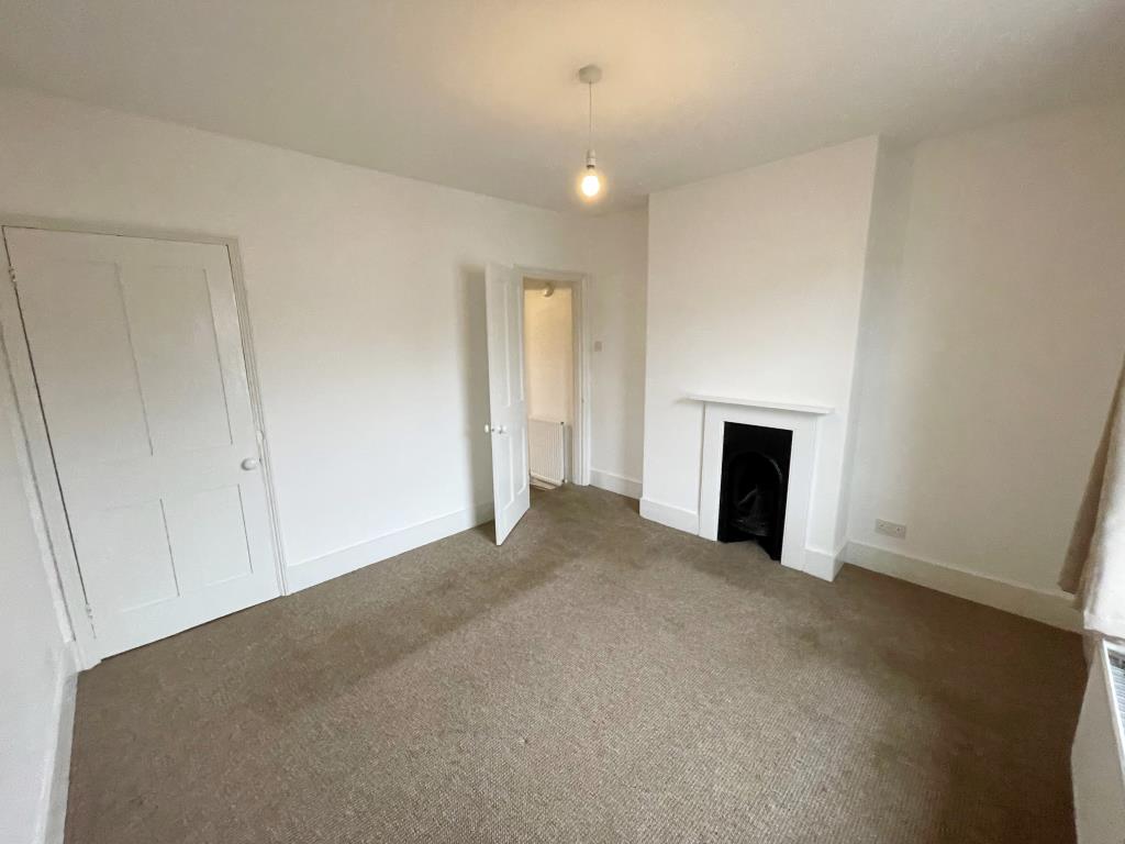 Lot: 150 - SEMI-DETACHED HOUSE FOR REFURBISHMENT AND REPAIR - Bedroom with grey carpet